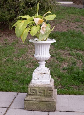 Lot 836 - A cast iron campana-shaped vase