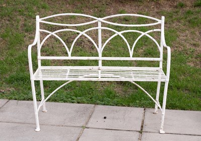 Lot 837 - A Regency wrought iron strap work garden seat