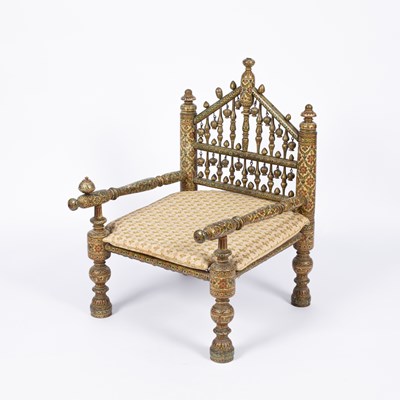 Lot 808 - An Indian low armchair