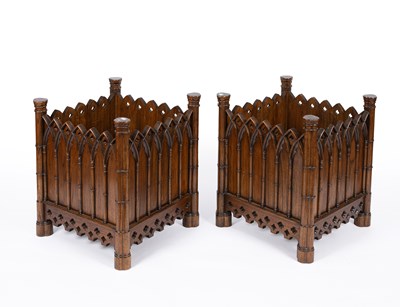 Lot 811 - A pair of Gothic Revival country house log bins or planters