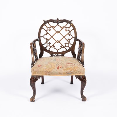 Lot 812 - A George II style mahogany open armchair