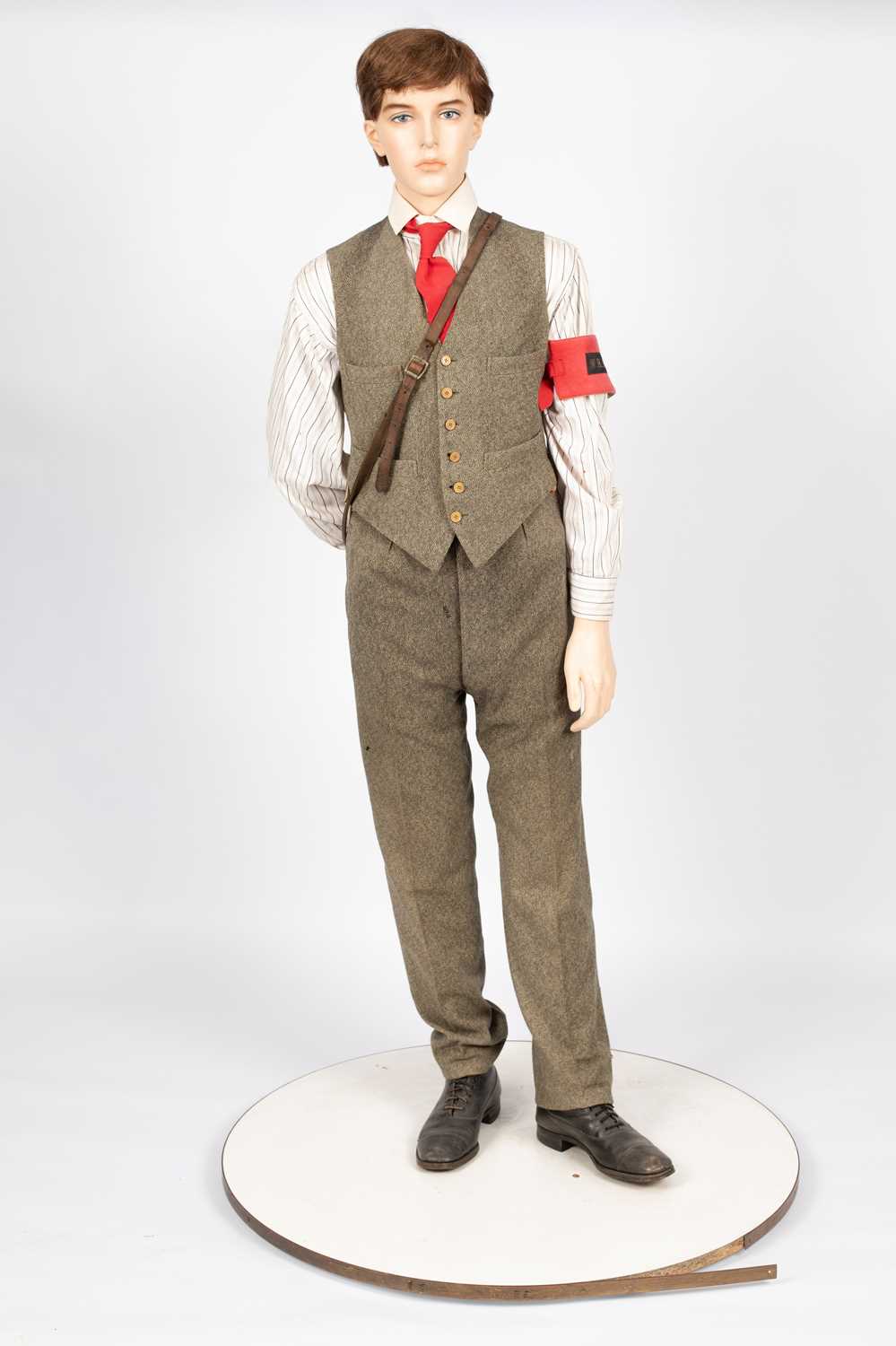 Lot 24 - A W. H. Smith display mannequin of a newspaper seller