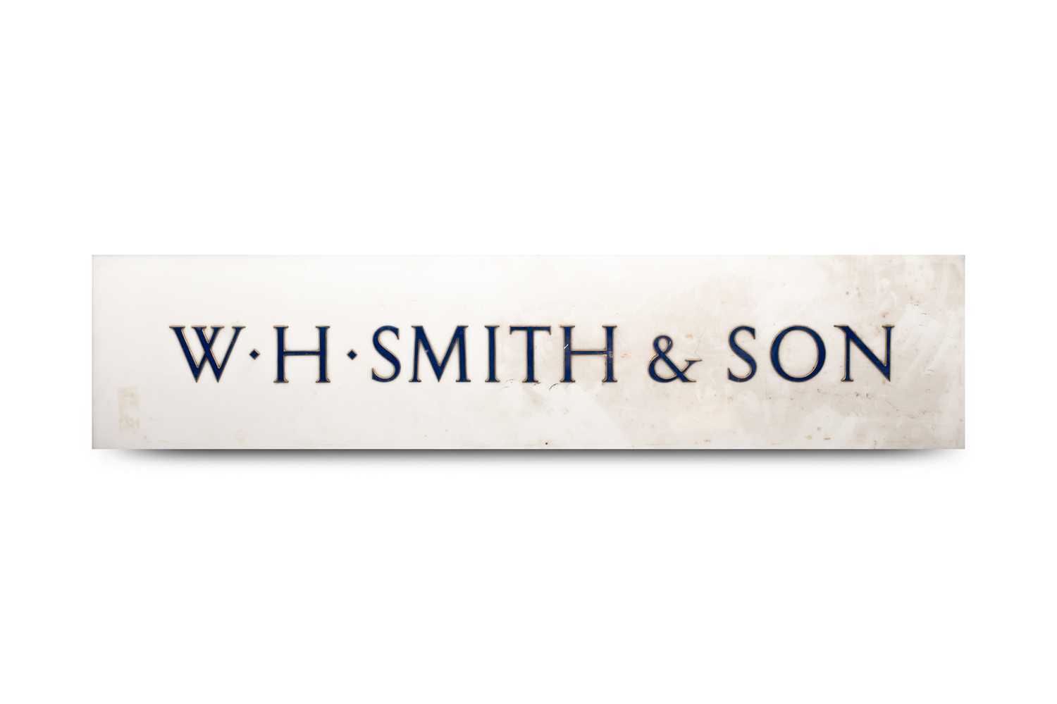 Lot 23 - A large acrylic W H Smith & Son wall sign