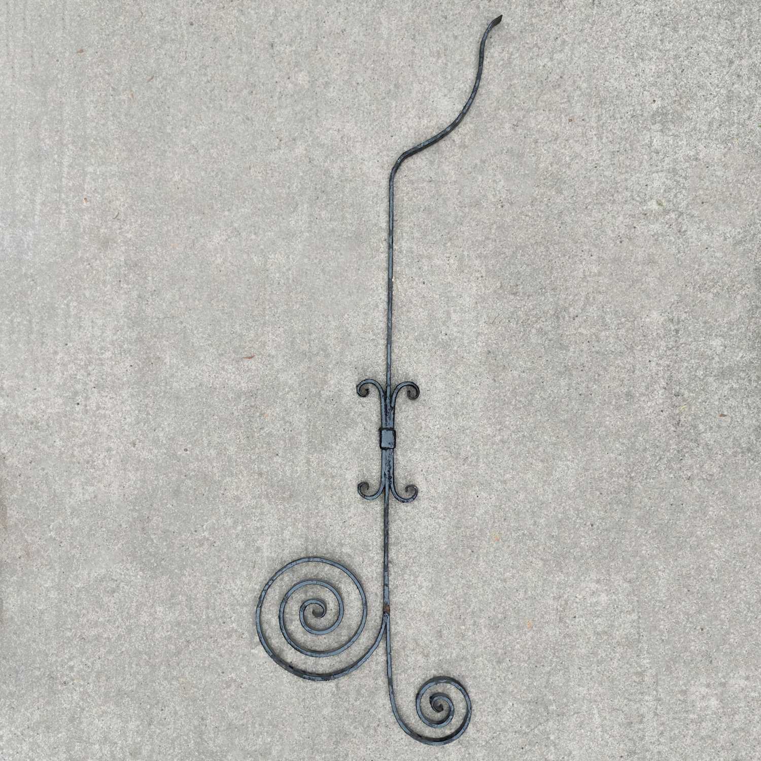Lot 47 - A large black painted wrought iron bracket