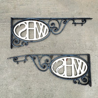 Lot 46 - A pair of large black painted wrought iron brackets