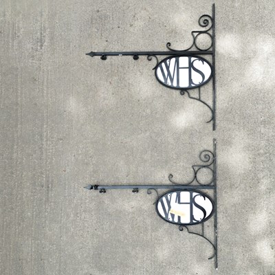 Lot 45 - A near pair of W. H. Smith wrought iron brackets