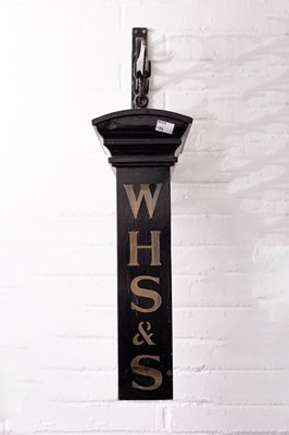 Lot 32 - A W. H. Smith Newsboy advertising sign
