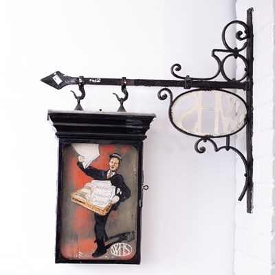 Lot 32 - A W. H. Smith Newsboy advertising sign