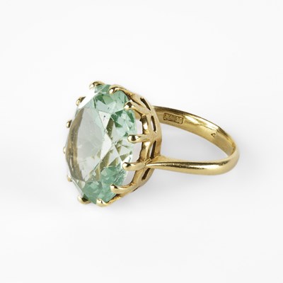 Lot 282 - A yellow metal and synthetic green spinel ring
