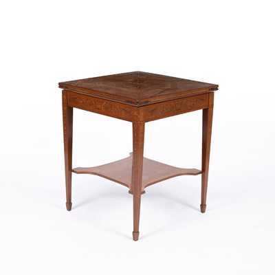 Lot 898 - An Edwardian inlaid envelope games table