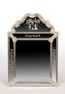 Lot 899 - A Venetian glass etched wall mirror