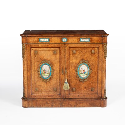 Lot 897 - A Victorian burr walnut pier cabinet