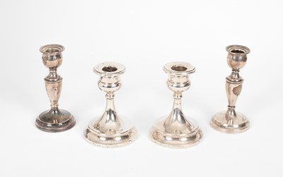 Lot 7 - Two pairs of silver desk candlesticks