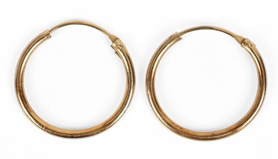 Lot 176 - A pair of 18k yellow gold hoop earrings