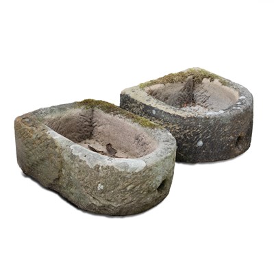 Lot 844 - Two small D-shaped stone troughs