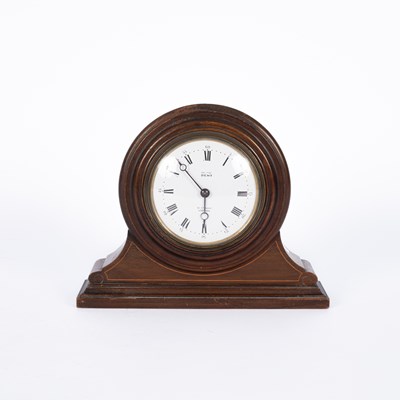 Lot 1012 - An Edwardian mahogany eight-day mantel clock