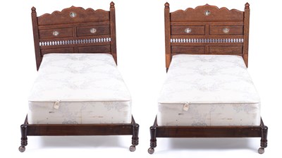 Lot 818 - A pair of profusely carved Indian beds