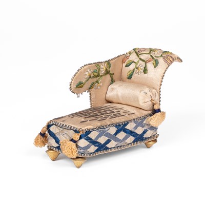 Lot 436 - A pincushion in the form of a dolls' house chaise longue