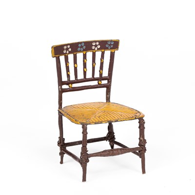 Lot 446 - An English cast pewter dolls' house chair
