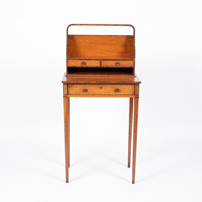 Lot 920 - A George III style satinwood cheveret desk
