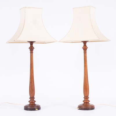 Lot 1265 - A pair of turned wooden table lamps