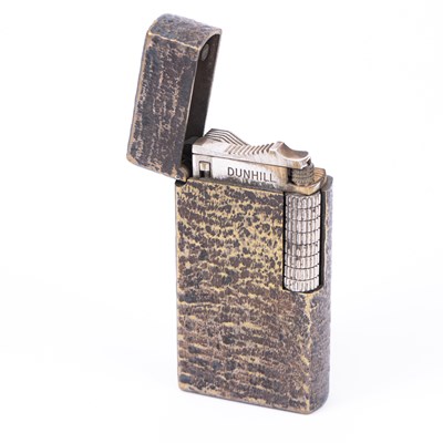 Lot 1266 - A Dunhill Rollagas silver plated lighter