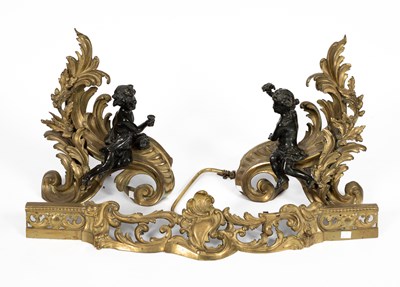 Lot 928 - A gilt brass fire curb