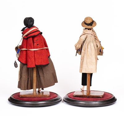 Lot 635 - A fine pair of large Grodnertal pedlar dolls