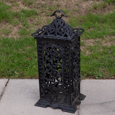 Lot 829 - A pierced cast iron cathedral heater casing