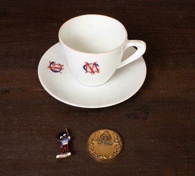 Lot 491 - A Japanese (Kondo China) porcelain MCC monogrammed teacup and saucer