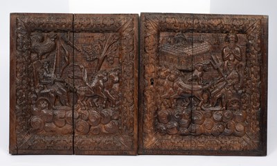 Lot 677 - A pair of carved oak panels