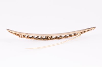 Lot 4 - A Victorian diamond set crescent brooch