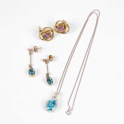 Lot 6 - A topaz and diamond pendant necklace