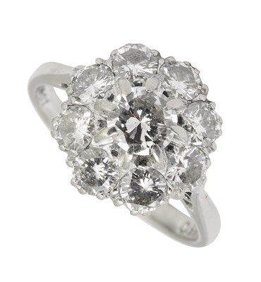 Lot 657 - A white gold and diamond circular cluster ring