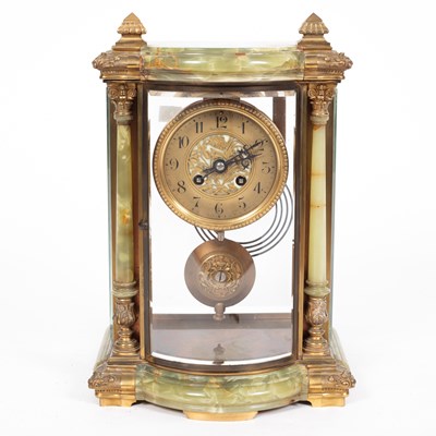 Lot 131 - Tiffany & Co., A French green onyx mantel clock