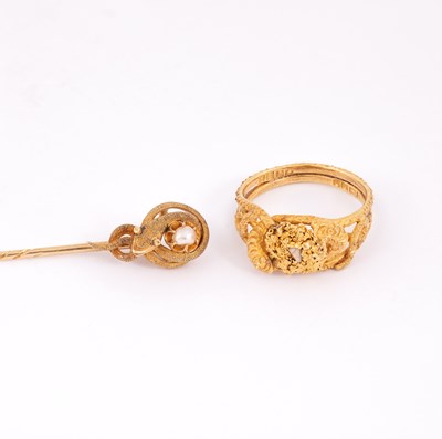 Lot 108 - A yellow metal serpent ring and stick pin