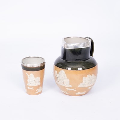 Lot 874 - A Royal Doulton stoneware jug