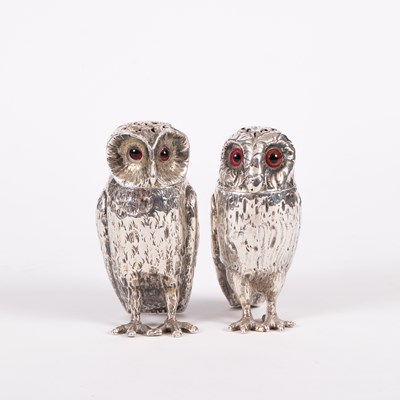 Lot 28 - Two Victorian novelty silver owl pepper pots