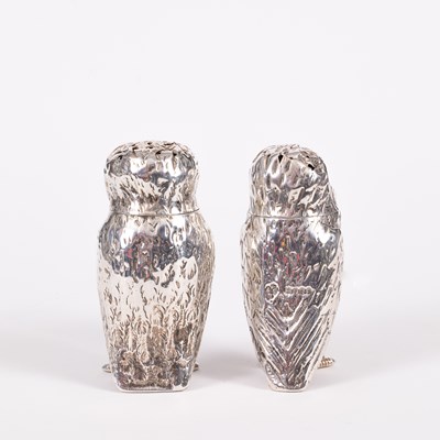 Lot 28 - Two Victorian novelty silver owl pepper pots