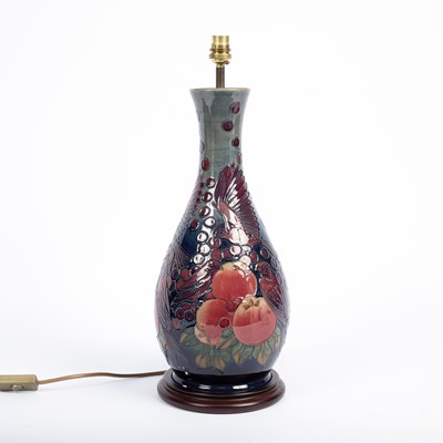 Lot 193 - A Moorcroft Fruit and Bird pattern table lamp