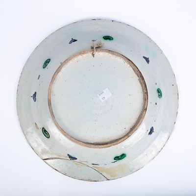 Lot 614 - An Iznik pottery dish