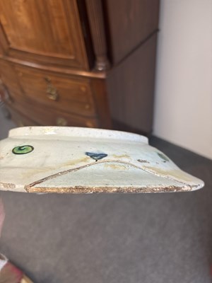 Lot 614 - An Iznik pottery dish