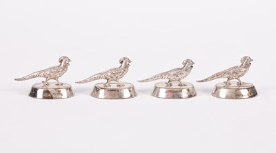 Lot 120 - A set of four novelty silver menu or place card holders