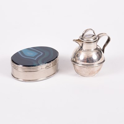 Lot 127 - An Edwardian miniature silver Guernsey jug