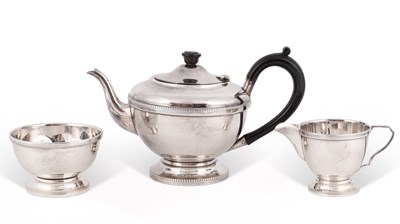 Lot 115 - A silver three-piece tea set