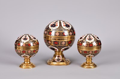 Lot 103 - A set of three Royal Crown Derby Millennium Globes