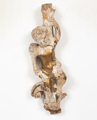 Lot 653 - A carved gilt wooden figure of a cherub