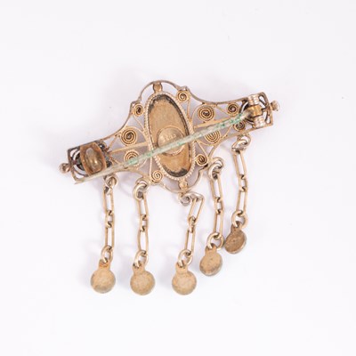 Lot 23 - A Norwegian Art Nouveau silver filigree and blue enamel brooch