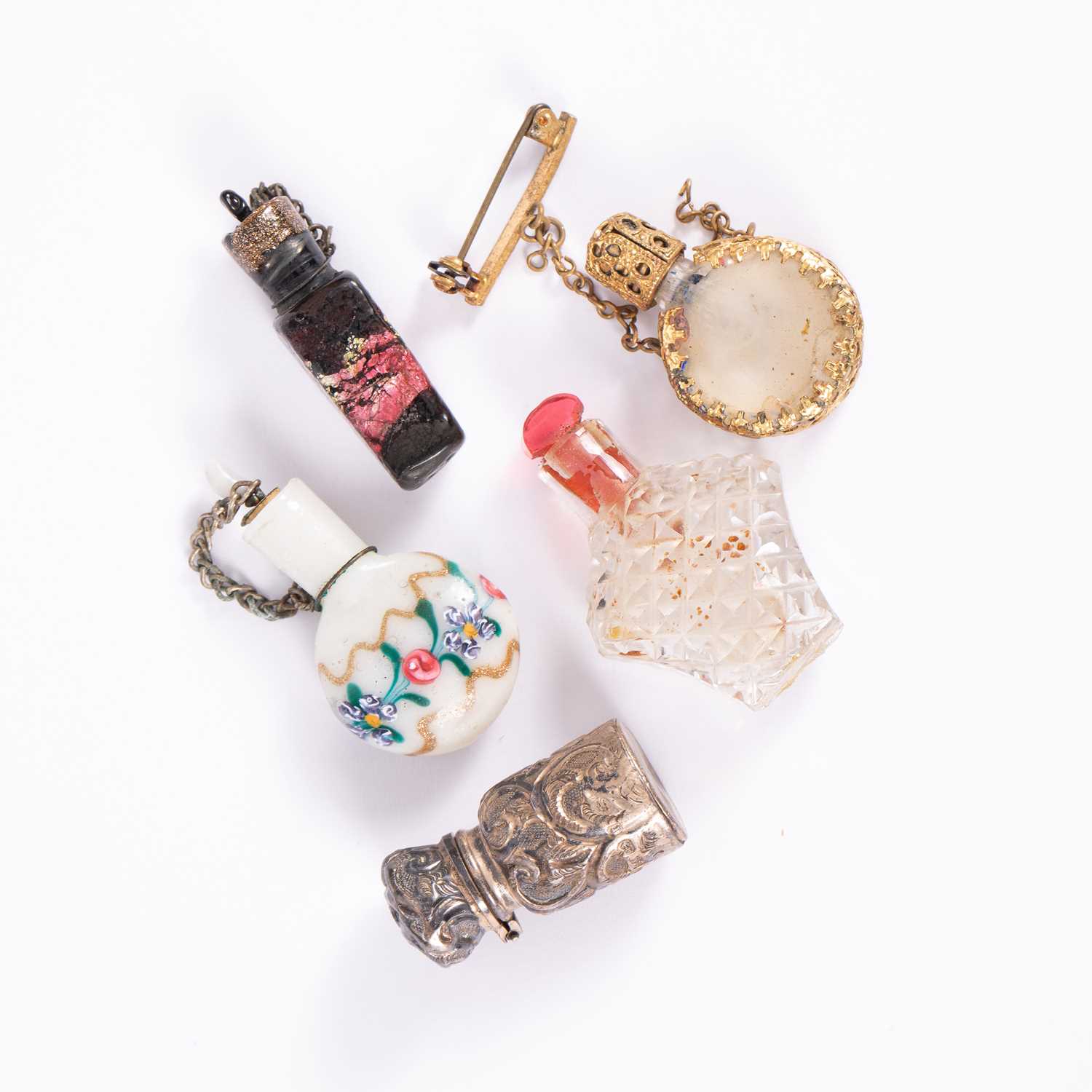 Lot 83 - Five miniature scent bottles