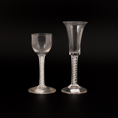 Lot 845 - Two English double series opaque twist wine glasses